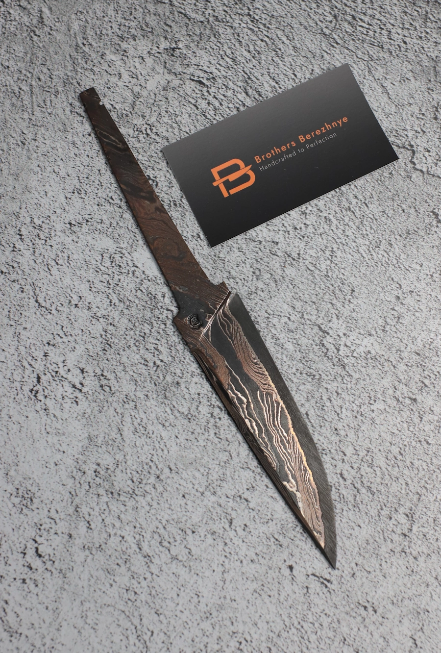 IMG_0077 Hand-forged San Mai blade with 9ХФ core and etched layered cladding. Exceptional hardness, unique pattern, perfect for custom knives.